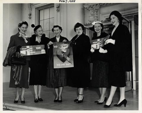 Mamie D. Eisenhower receives women volunteers for the Heart Fund. Right to Left : Mrs. Estes Kefauver, Mrs. Herbert Brownell, Mrs. Fred Vinson, Mamie Eisenhower, Mrs. St. Louis and unknown. July 7, 1955 [72-1219]